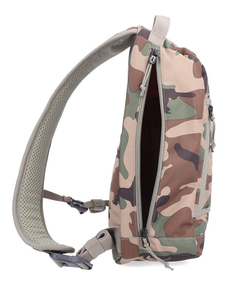 Geanta SIMMS Tributary Sling Pack Woodland Camo