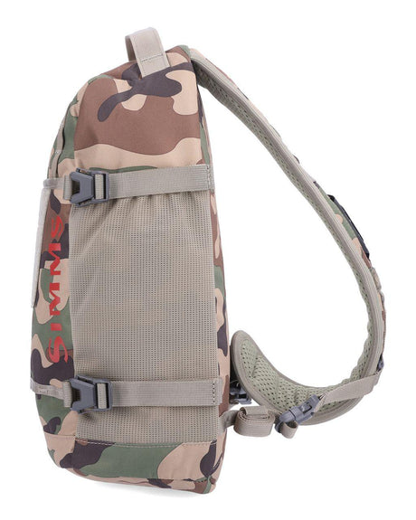 Geanta SIMMS Tributary Sling Pack Woodland Camo