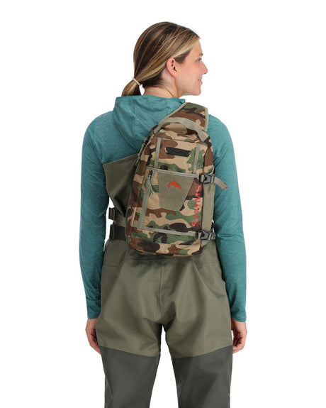 Geanta SIMMS Tributary Sling Pack Woodland Camo